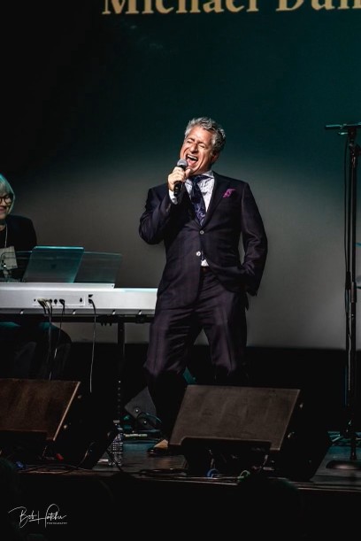 Jazz vocalist John Neudorf performing live
